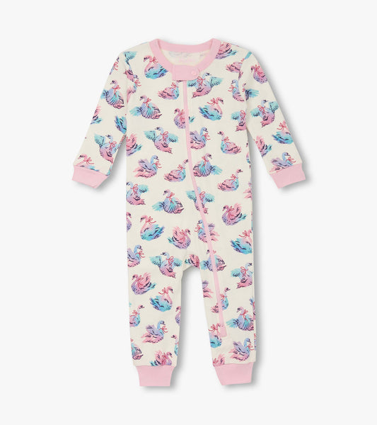 Cotton sleeper for baby girls featuring a pastel swan print, long sleeves, and pink trim. Available in multiple sizes.