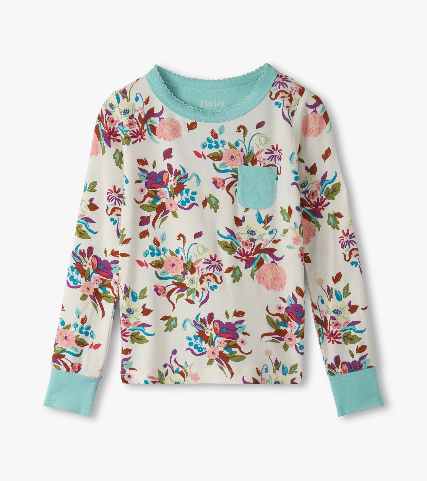 Long-sleeve pajama top in cream with colorful floral print and turquoise cuffs, featuring a small chest pocket.