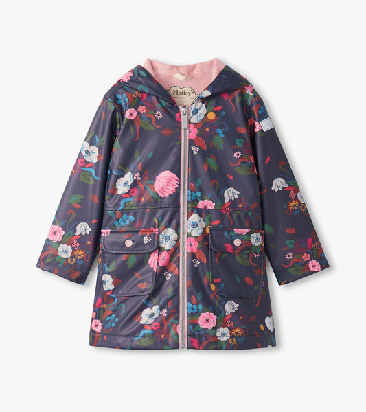 Navy zip-up rain jacket with a floral pattern, hood, and front pockets, designed for girls.