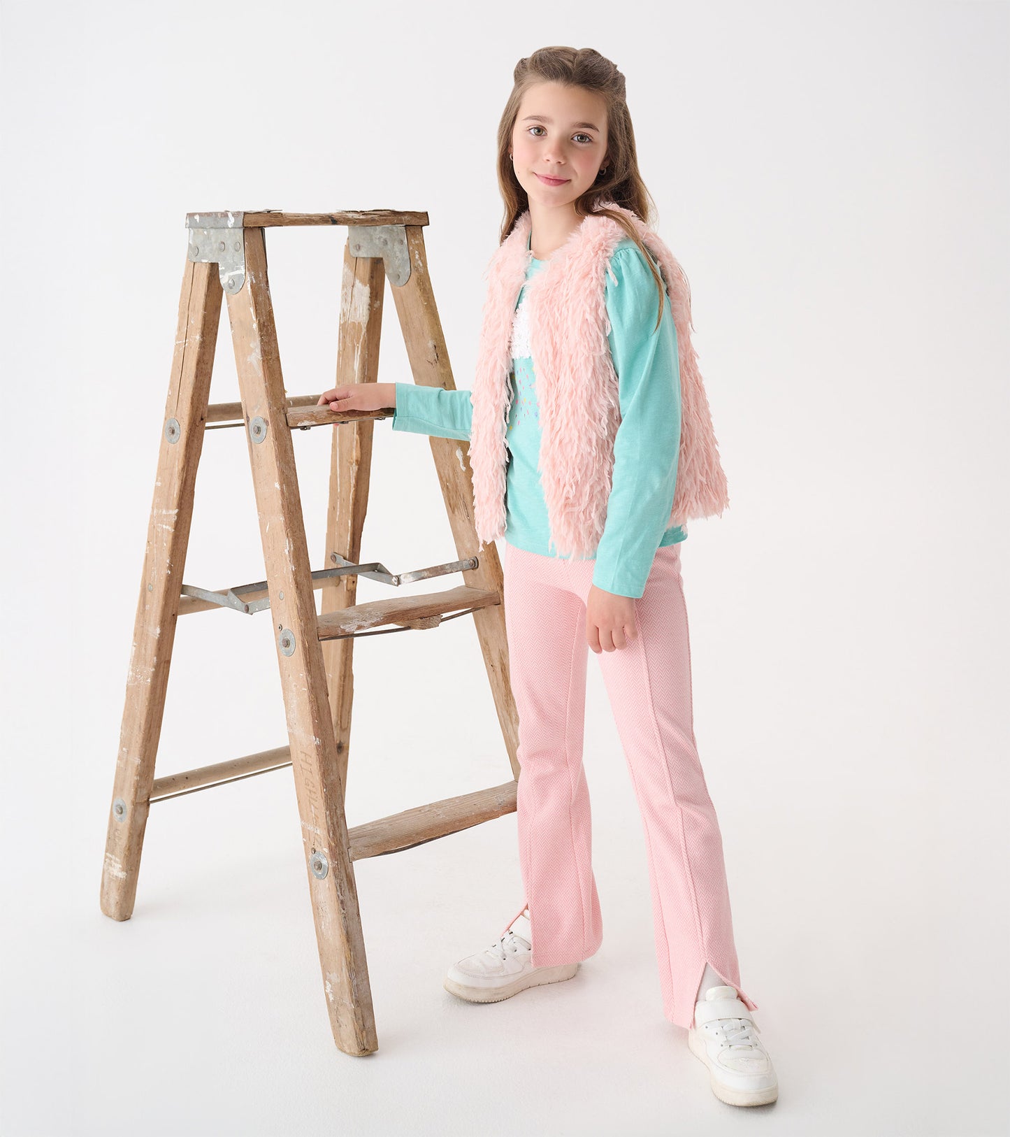 Veste en fausse fourrure – Plume rose pâle