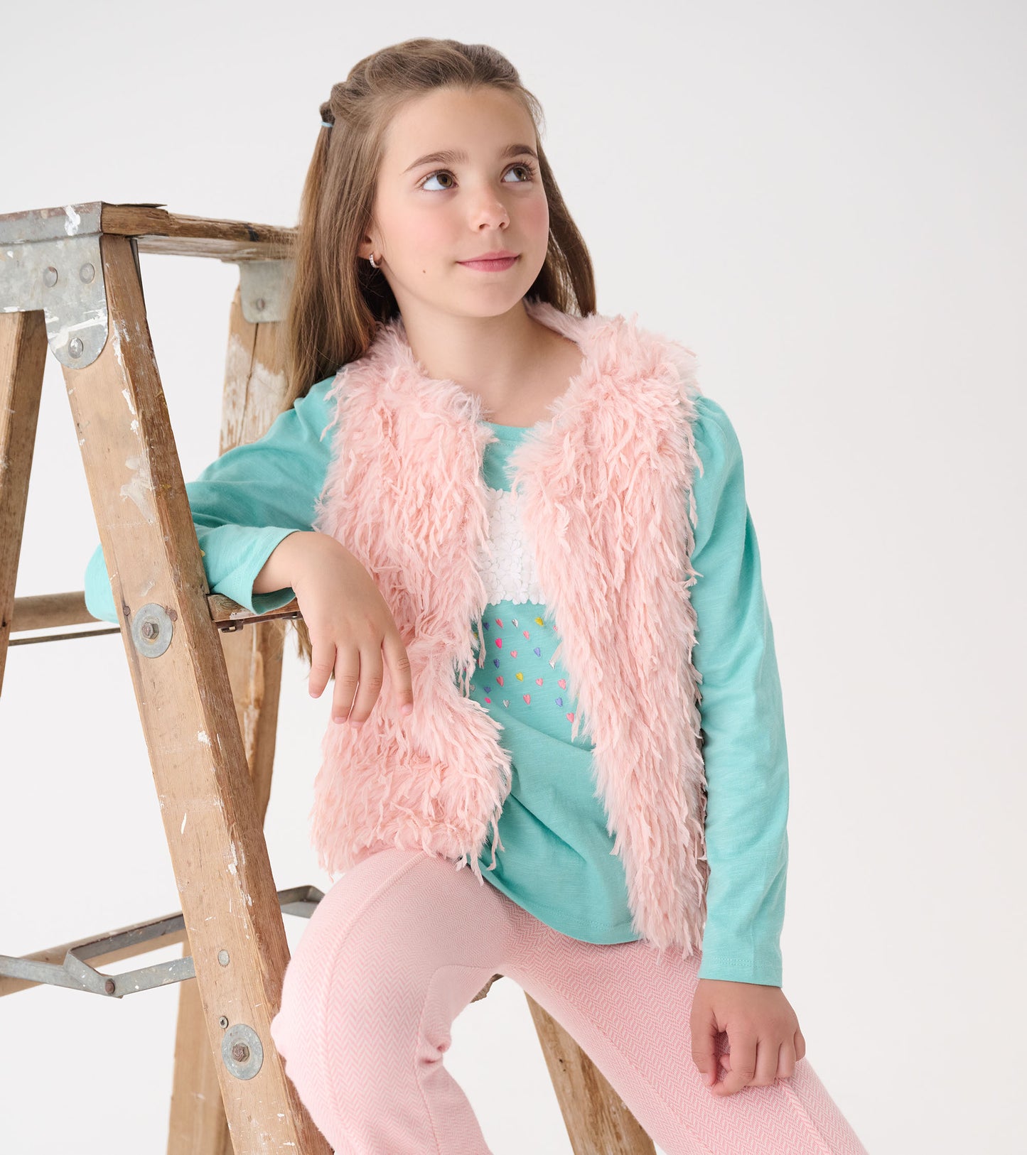 Veste en fausse fourrure – Plume rose pâle