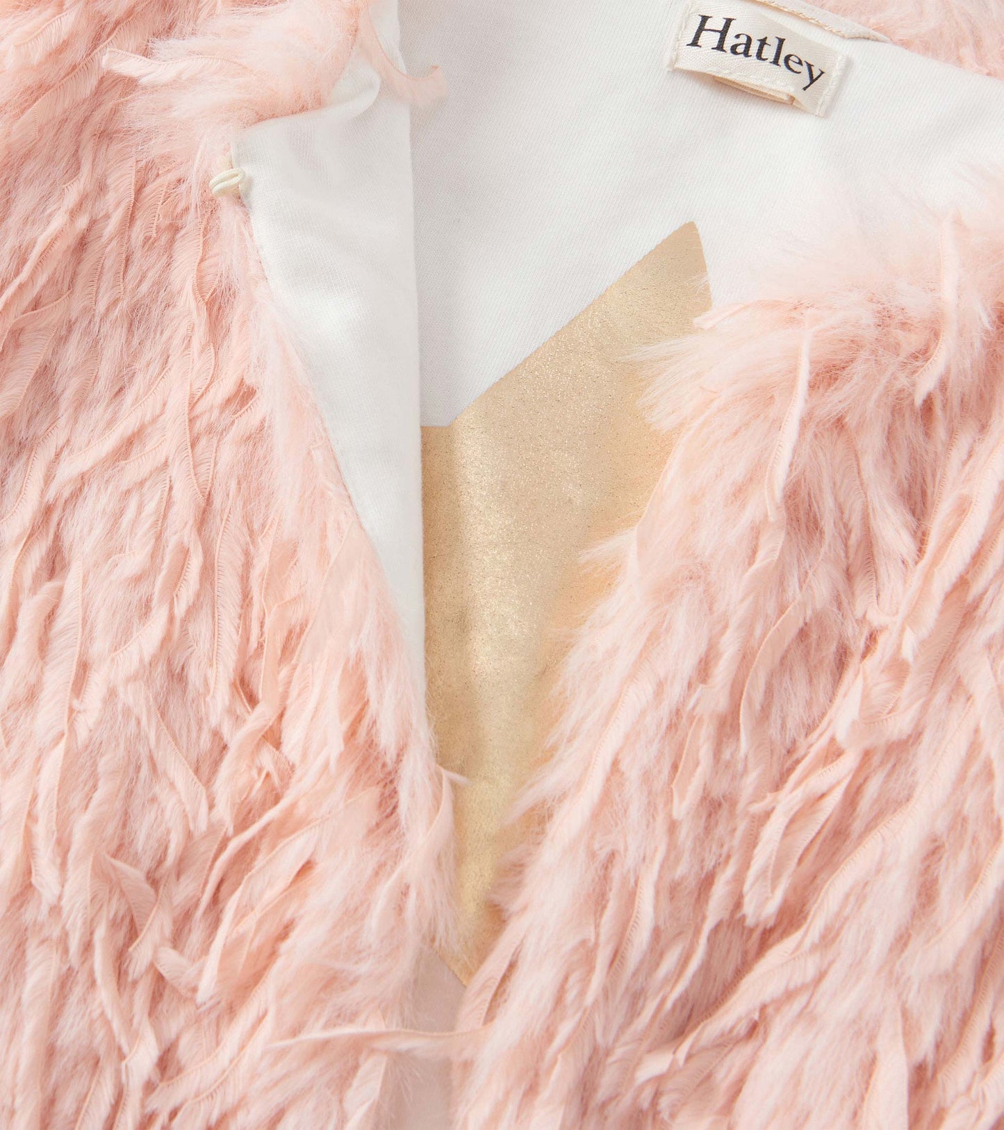 Veste en fausse fourrure – Plume rose pâle