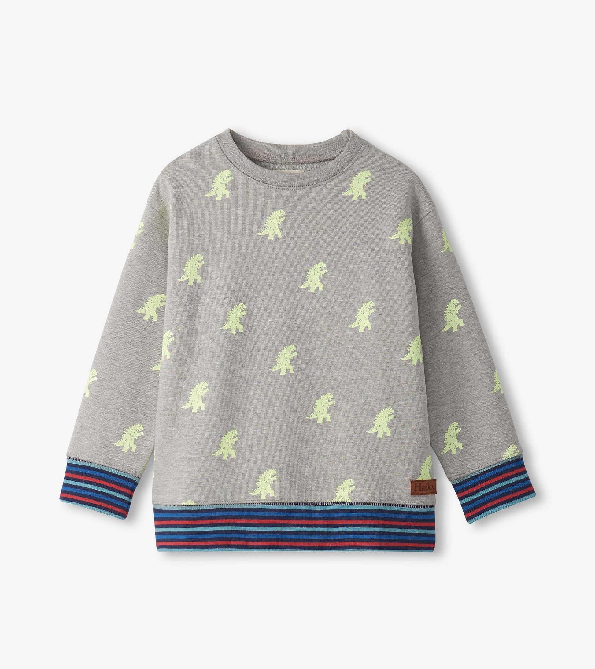 Gray pullover sweatshirt featuring green monster prints and a striped blue and red ribbed hem.