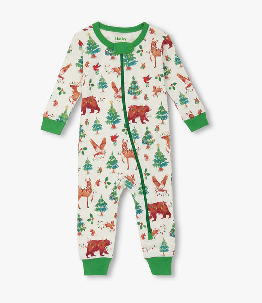 Cotton sleeper for baby boys featuring a holiday animal print with bears, deer, and trees, accented with green trim.