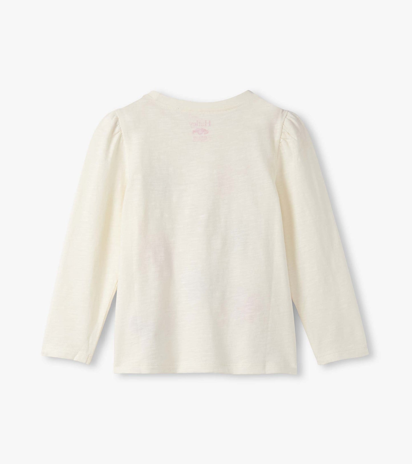 Light cream long-sleeve tee with puff sleeves and a round neckline, featuring a subtle graphic on the back.