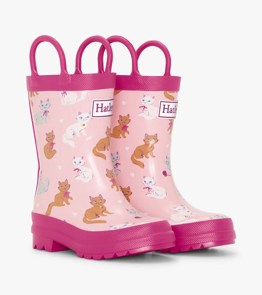 Pink rain boots featuring a playful kitty pattern, with two handles for easy wear. Ideal for toddlers.