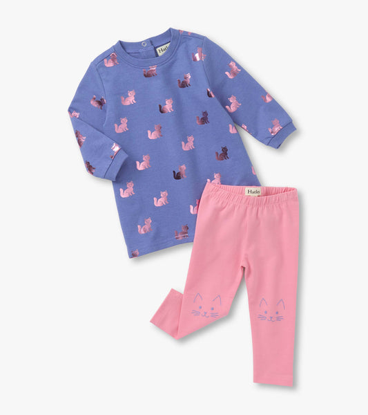 Purple long-sleeve dress with kitty print and pink leggings featuring cat faces on the ankles.