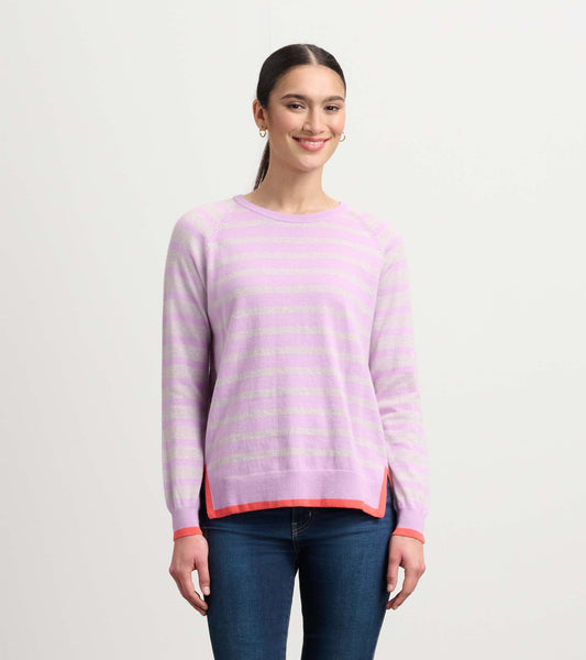 Lilac pink striped sweater with a relaxed fit, featuring contrasting orange trim at the hem and cuffs.