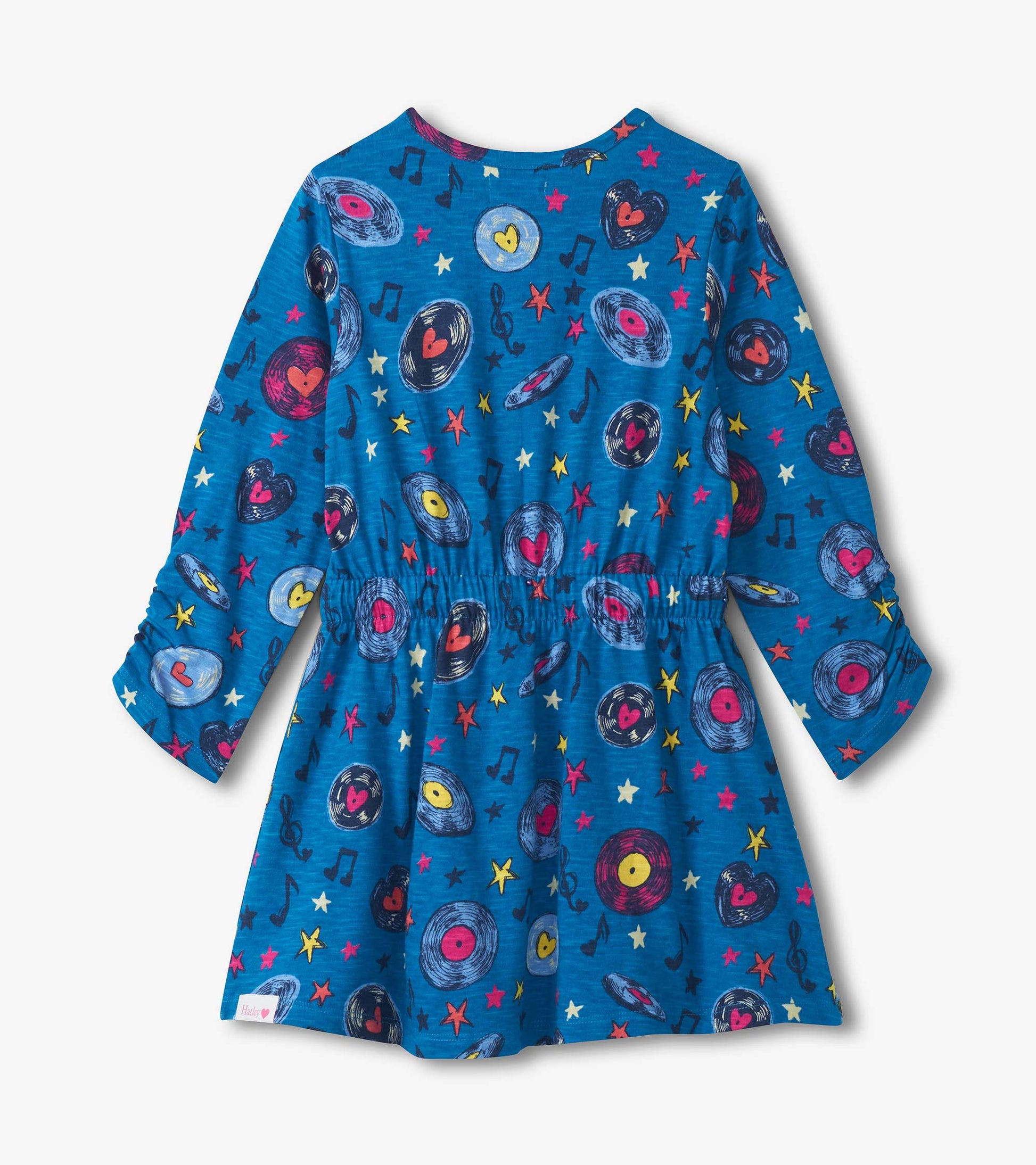 Blue cinched waist dress featuring a playful music-themed pattern with records, hearts, and stars. Long sleeves.
