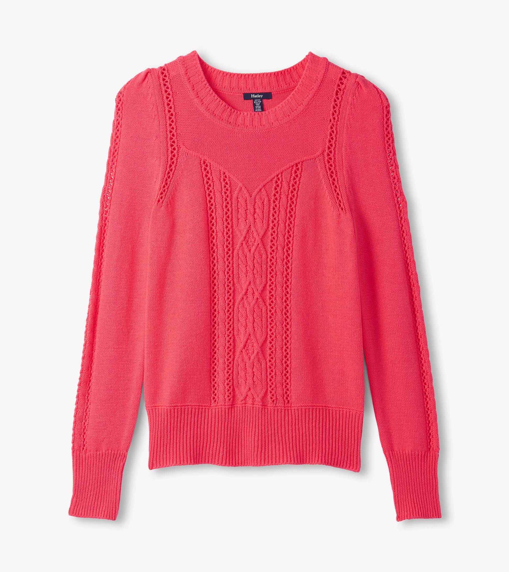 Neon melon sweater featuring a textured cable knit design and ribbed cuffs, with a classic crew neckline.