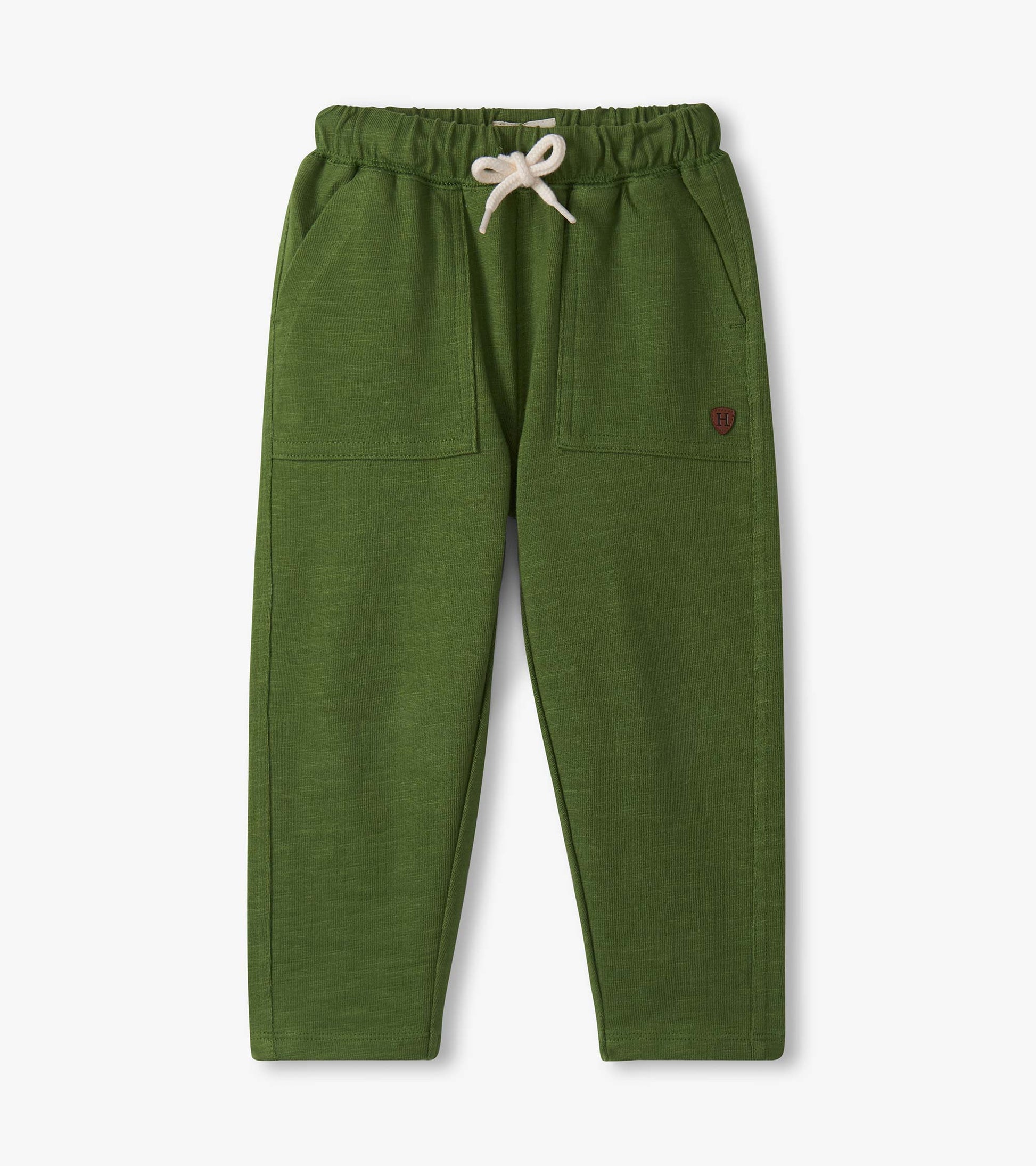 Green lounge pants for baby and toddler boys with an elastic waistband and front pockets.