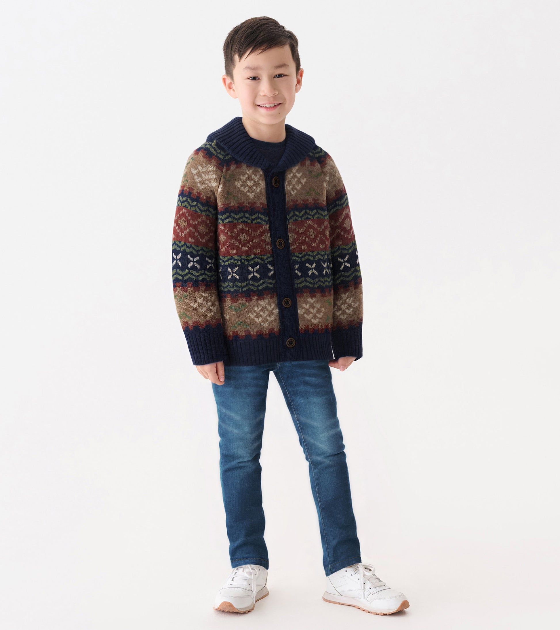 Boys' shawl collar cardigan featuring a vintage Fair Isle pattern in earthy tones with navy accents and wooden buttons.