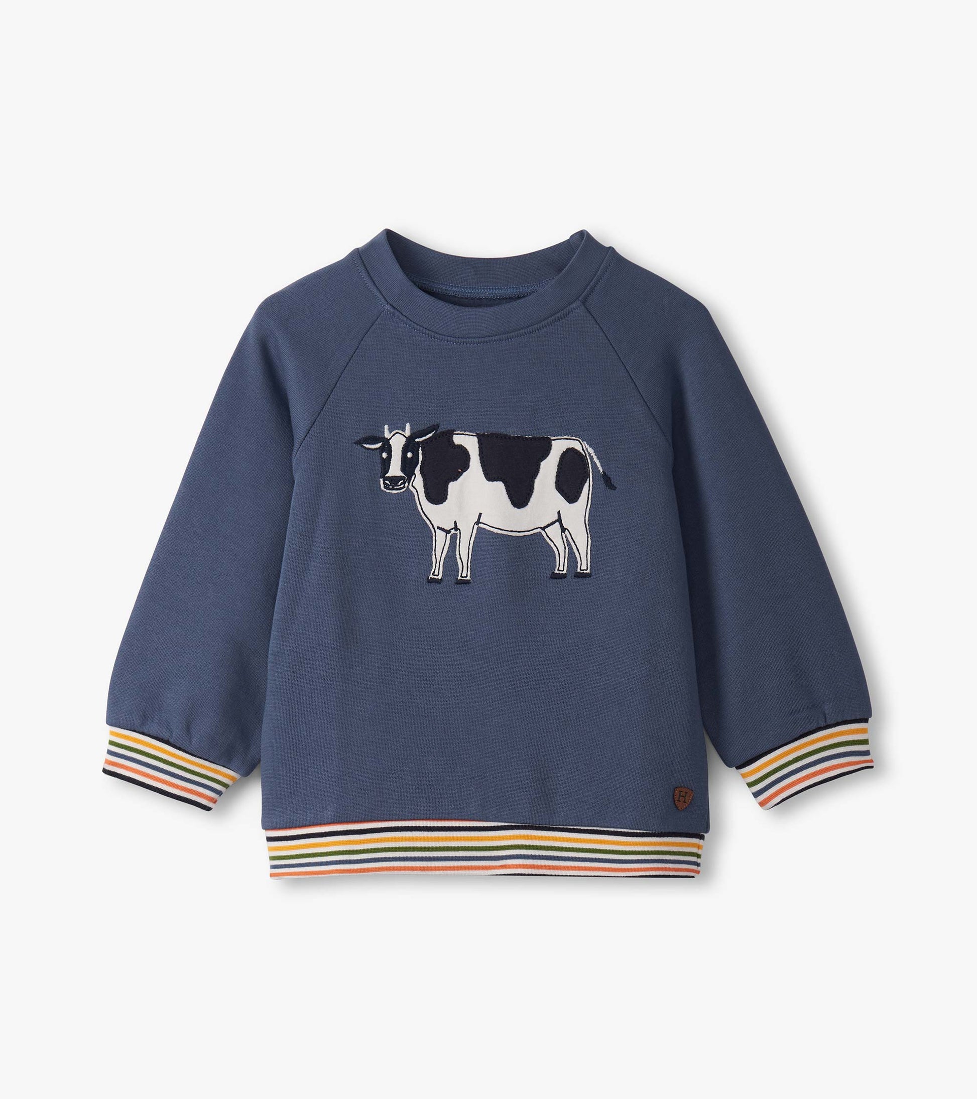 Navy pullover sweatshirt for boys featuring a cow graphic and colorful striped cuffs and hem. Suitable for toddlers.