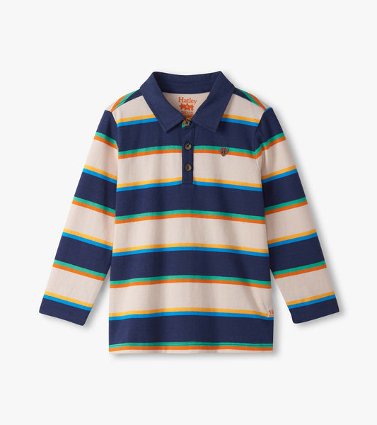 Long-sleeve rugby shirt featuring navy blue, cream, and colorful horizontal stripes with a collared neckline.