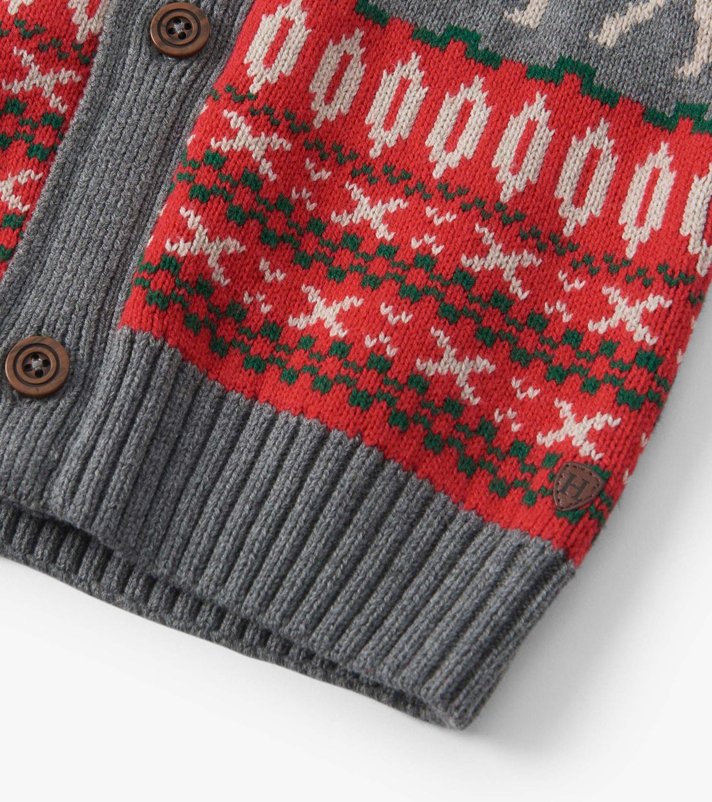 Red and gray knit cardigan featuring a festive elk pattern, ribbed cuffs, and wooden buttons.