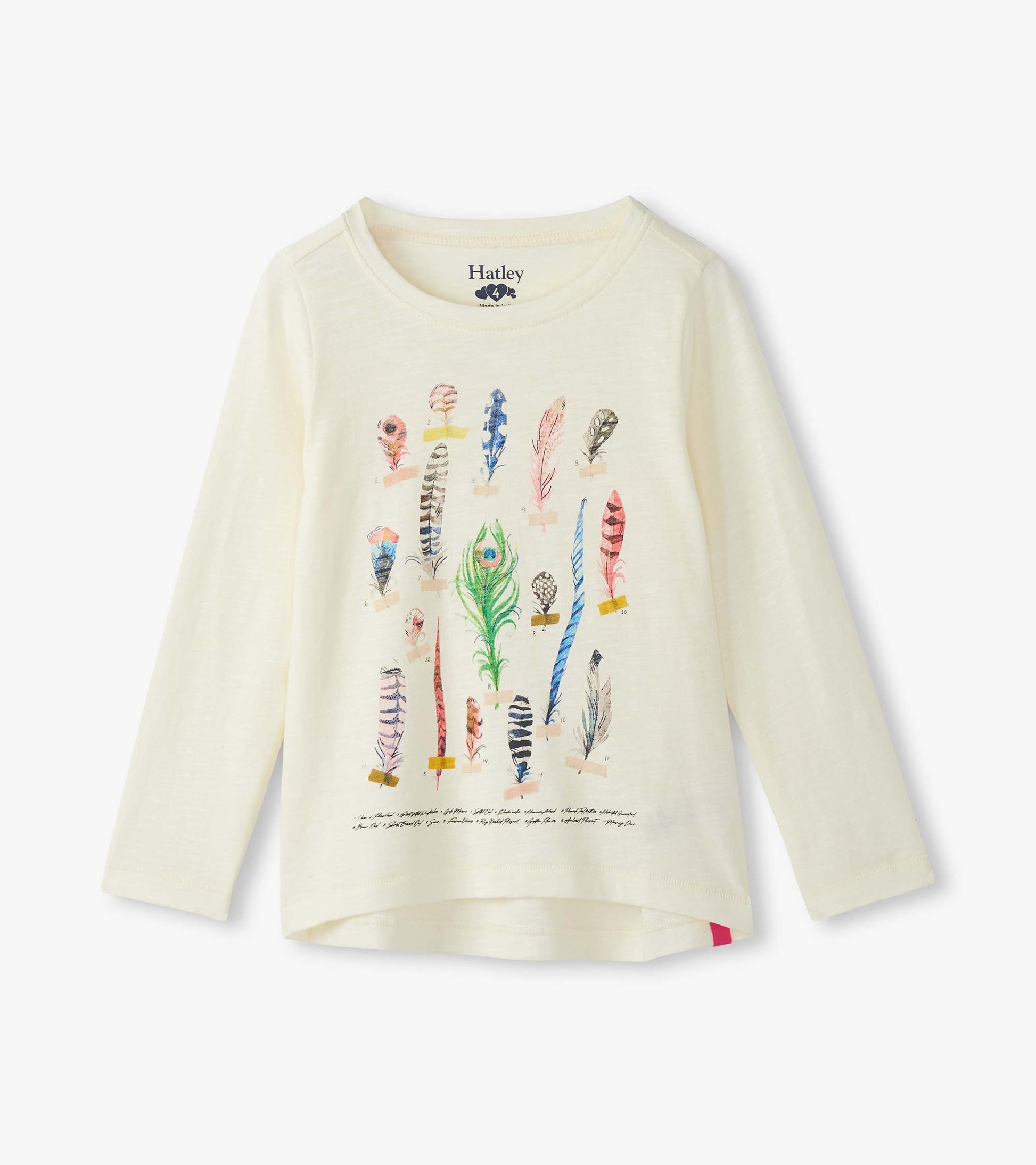 Cream long sleeve tee featuring colorful feather graphics on the front, with a rounded neckline and a relaxed fit.