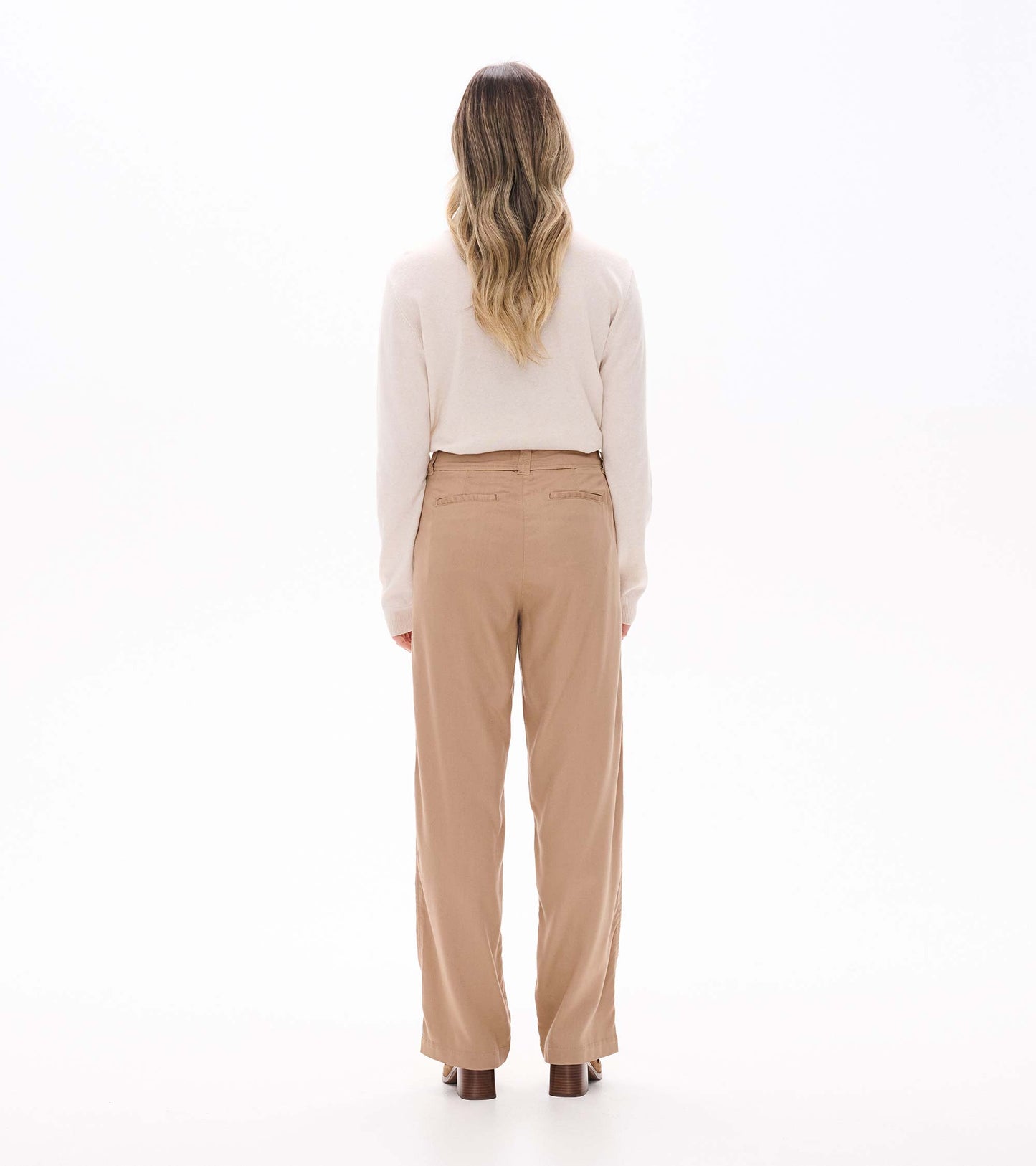 Back view of burro wide leg pants with straight wide legs, belt loops, and back welt pockets
