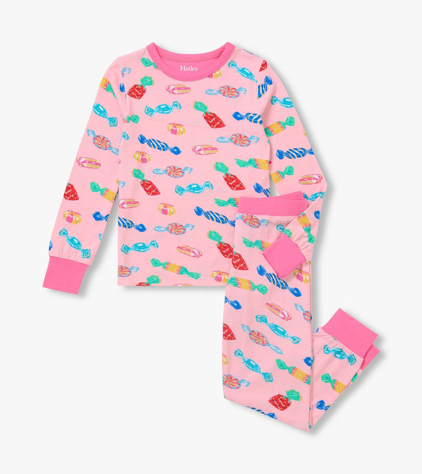Kids pink pajama set with colorful candy print, long-sleeve top, matching pants, and bright pink cuffs