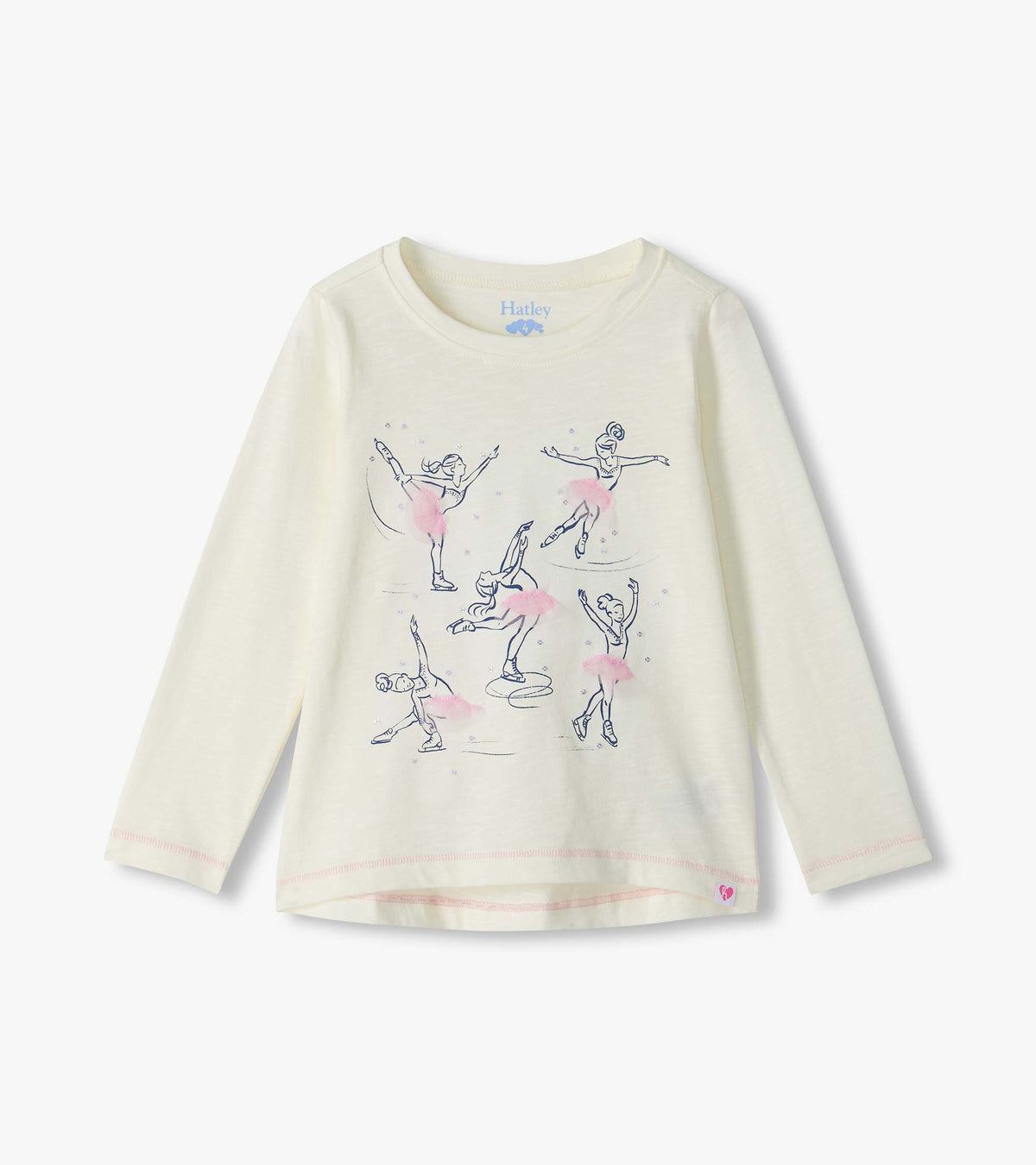 Cream long sleeve tee with figure skater graphic and pink tutu accents on the front