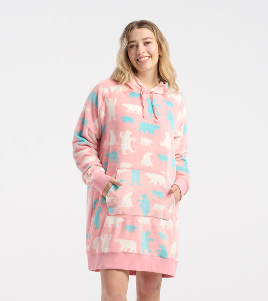 Pink oversized fleece hoodie featuring polar bear patterns in white and blue, with a front pocket and drawstring hood.