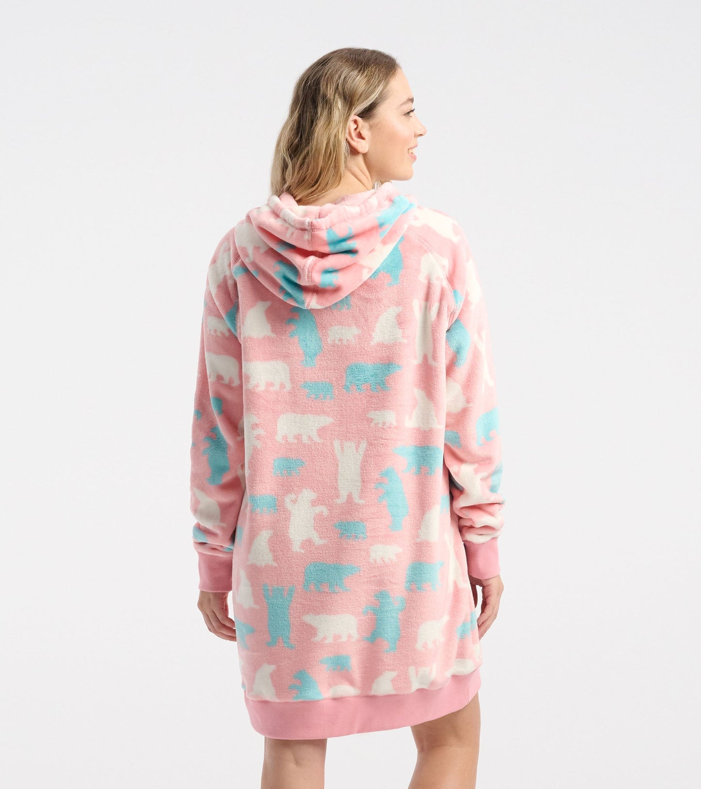 Oversized pink fleece hoodie featuring polar bear patterns in white and blue, with a cozy hood and long sleeves.