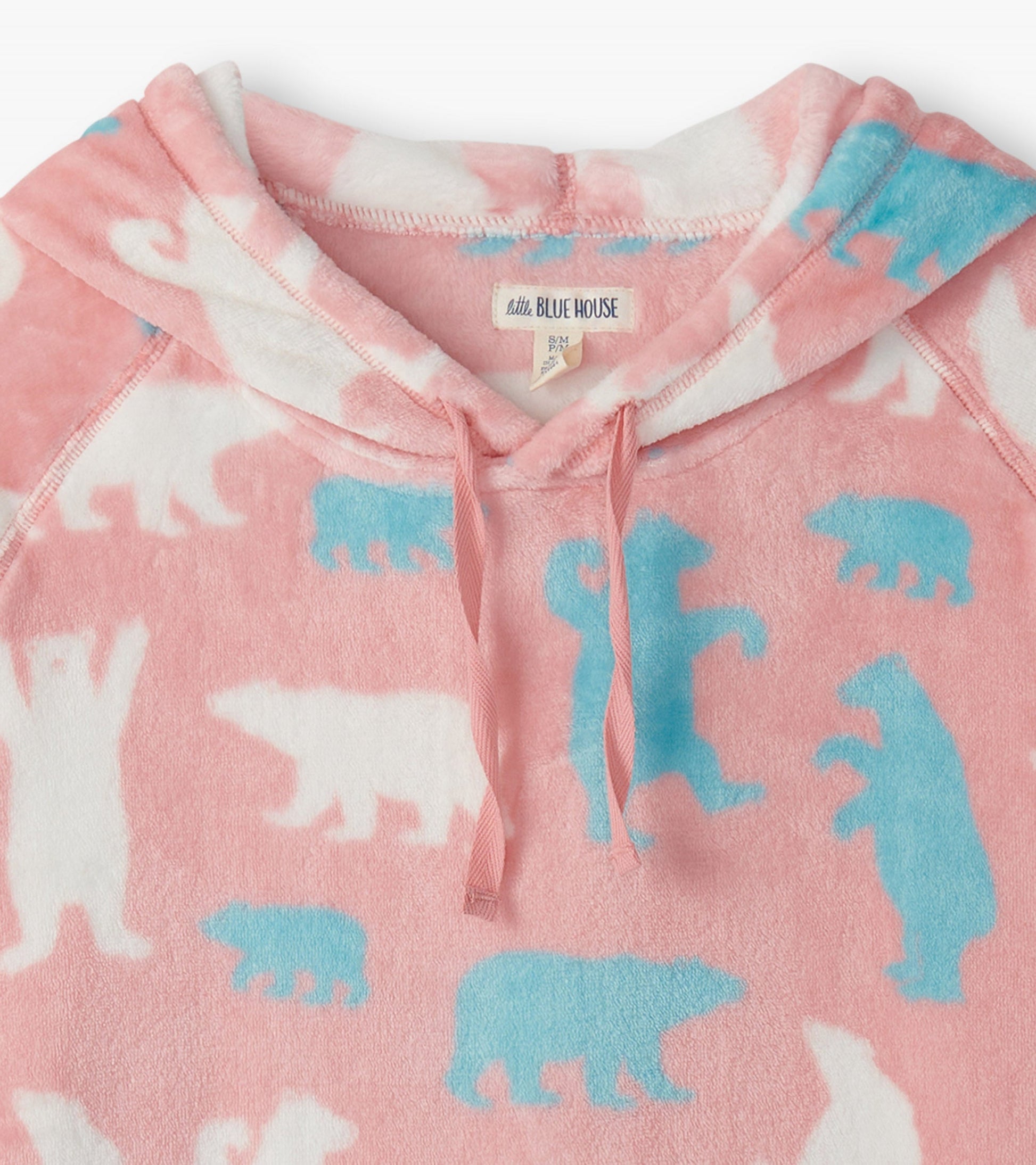 Pink oversized fleece hoodie featuring playful polar bear patterns in white and blue.