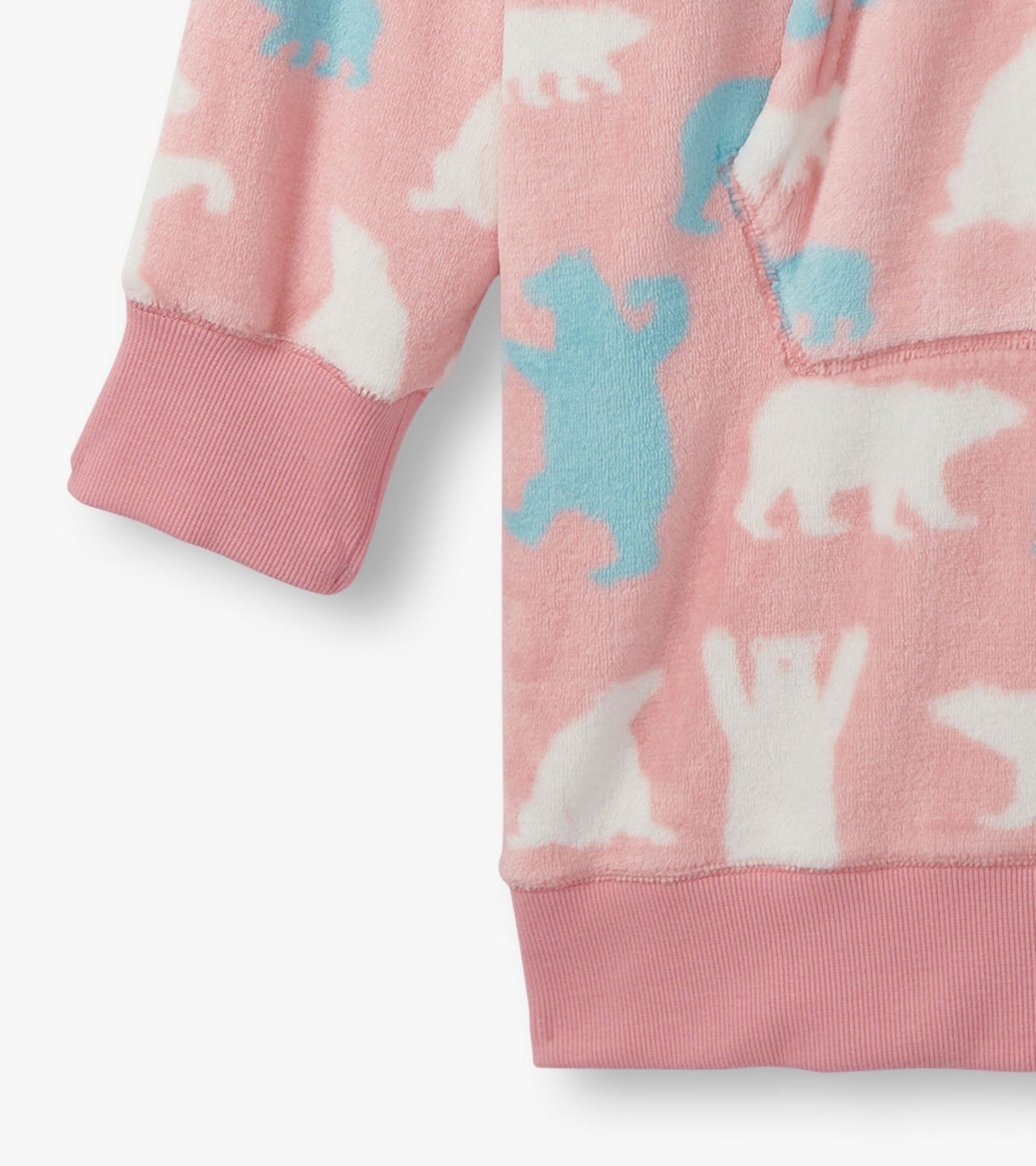 Pink oversized fleece hoodie featuring playful polar bear patterns in white and blue. Soft fabric with ribbed cuffs.