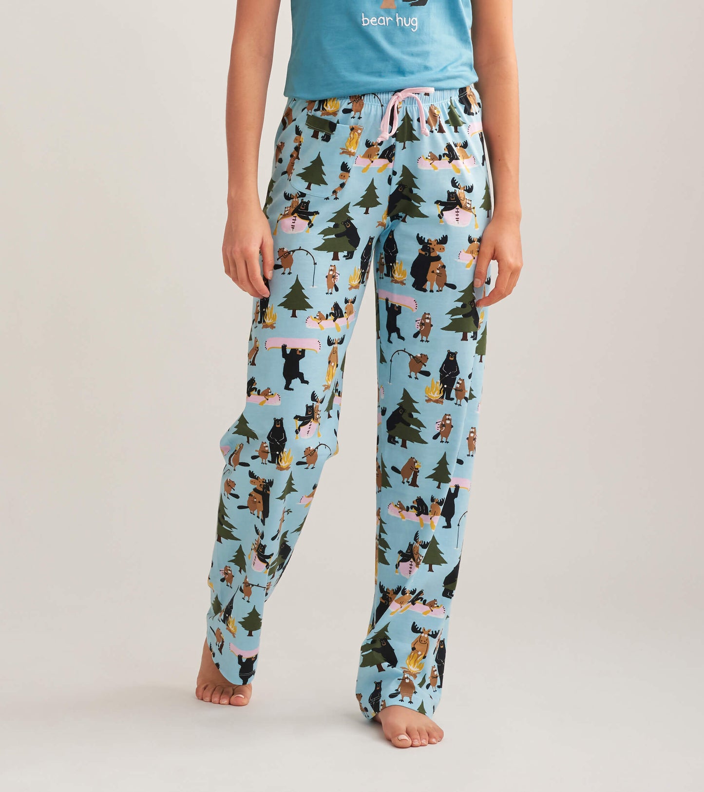 Light blue cotton pajama pants featuring a playful wildlife print with bears, moose, and trees. Relaxed fit with an elastic…