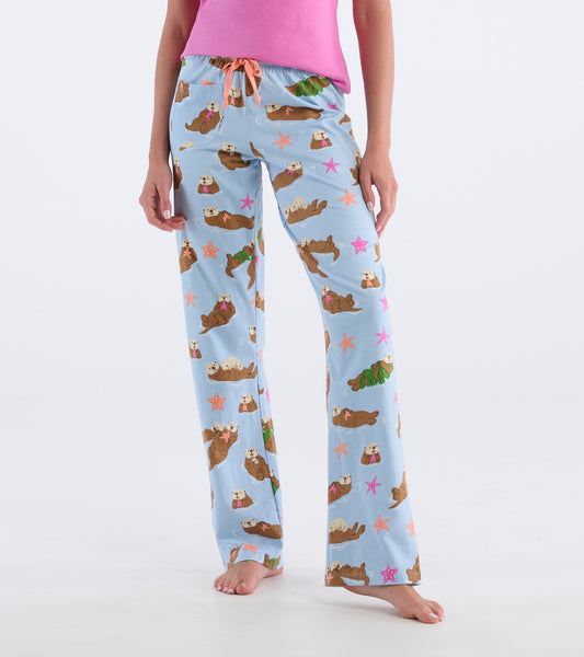 Light blue cotton pajama pants featuring a playful otter pattern with stars and seaweed, styled with an elastic waistband.