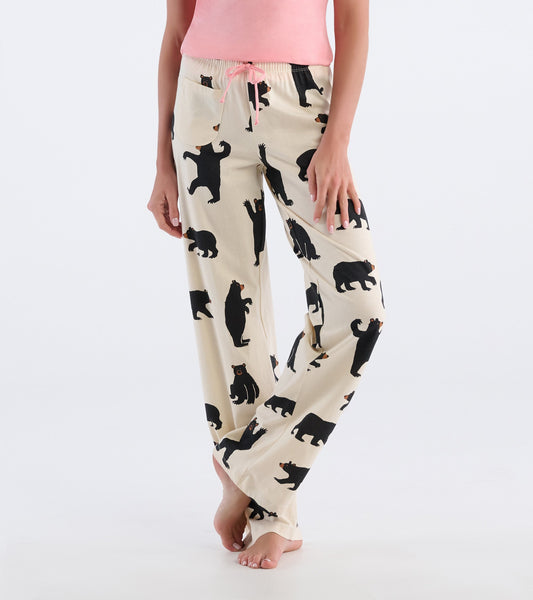 Natural cotton pajama pants featuring a playful black bear pattern, with an elastic waistband and drawstring.