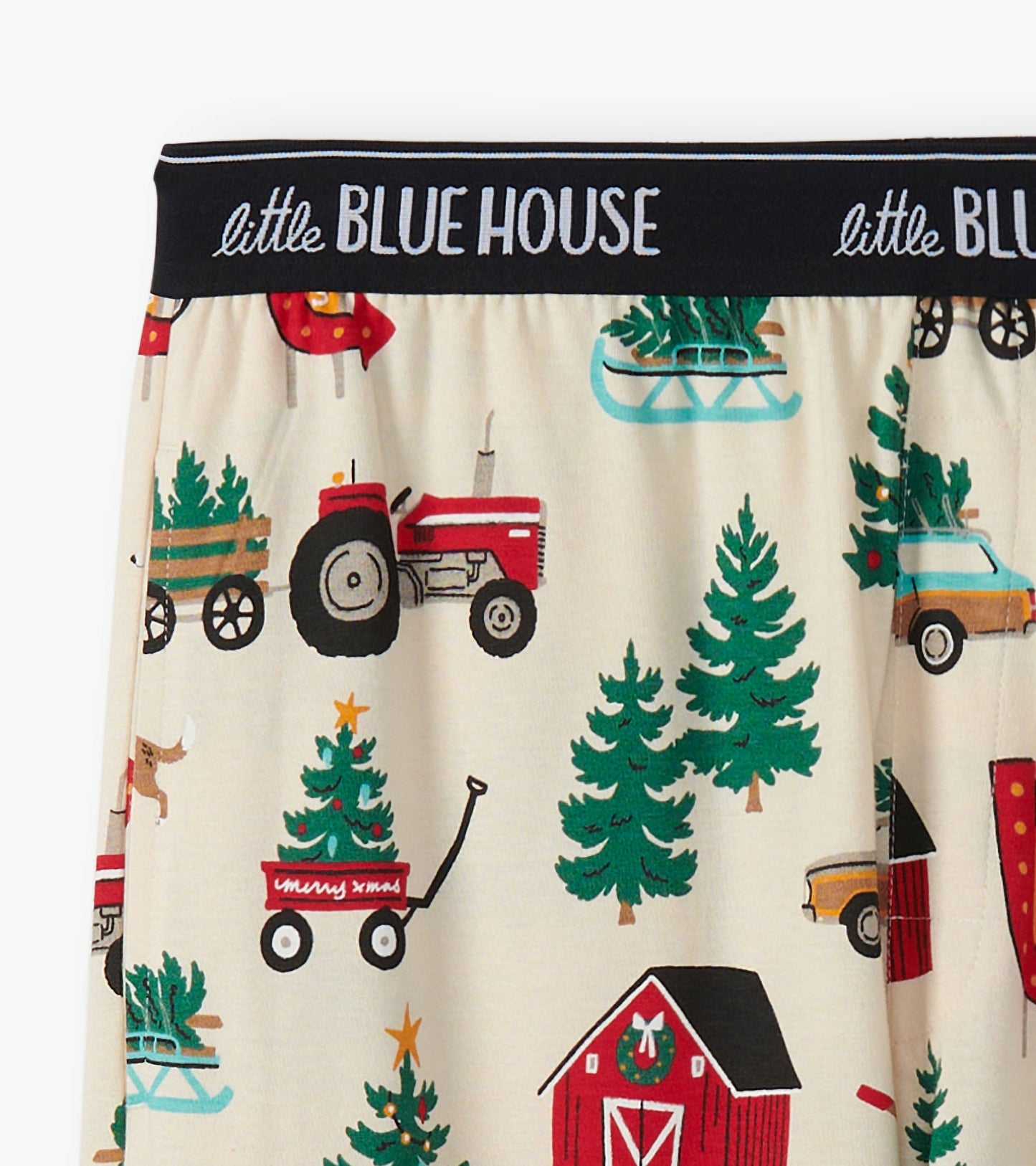 Cream cotton pajama pants featuring a festive Christmas tree farm pattern with tractors, trees, and barns.