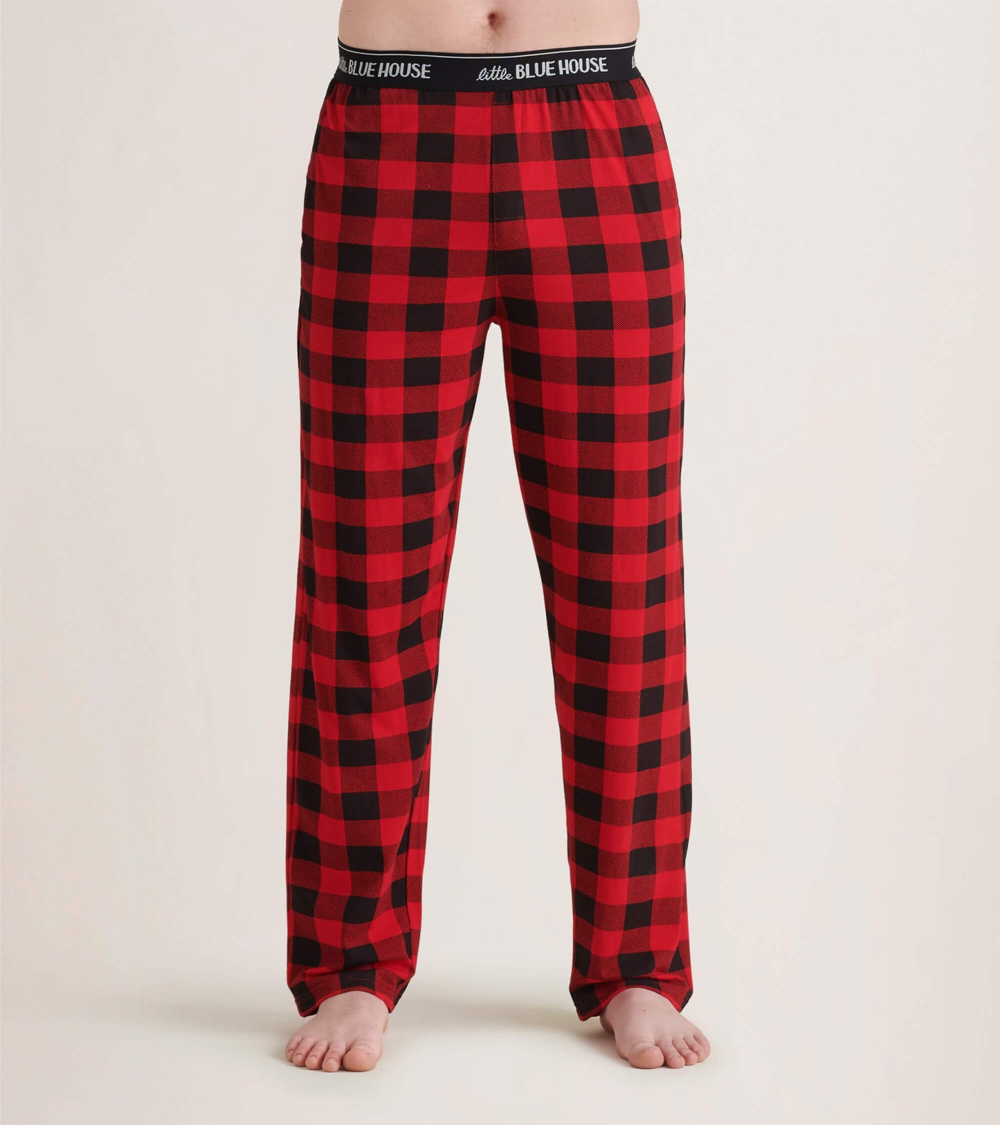 Red and black buffalo plaid men's pajama pants made of stretch cotton, featuring an elastic waistband.