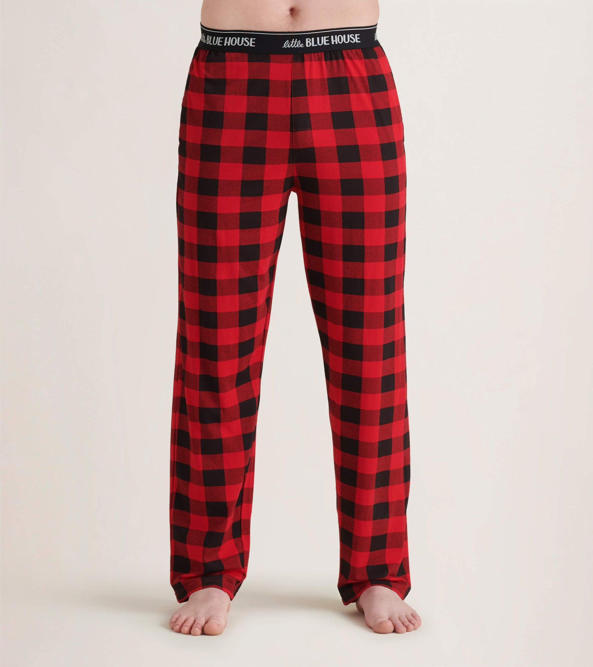 Red and black buffalo plaid men's pajama pants made of stretch cotton, featuring an elastic waistband.