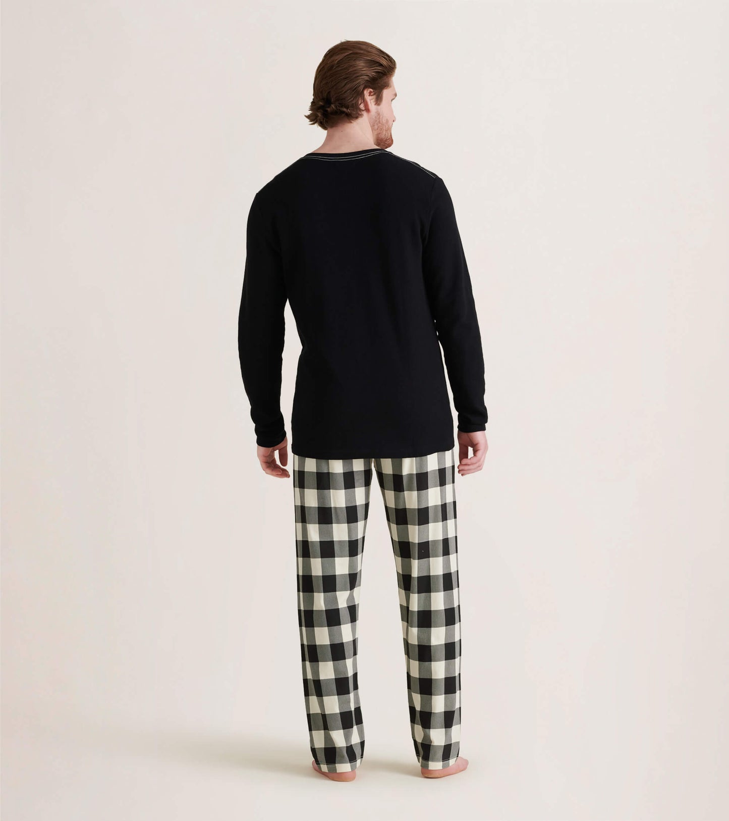 Men's cream plaid stretch cotton pajama pants, featuring a relaxed fit and elastic waistband, shown from the back.
