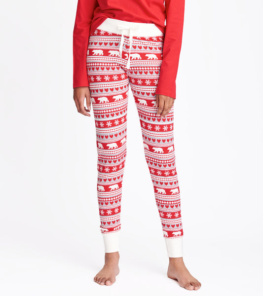Red sleep leggings featuring a Fair Isle pattern with bears, hearts, and snowflakes, finished with a white waistband.