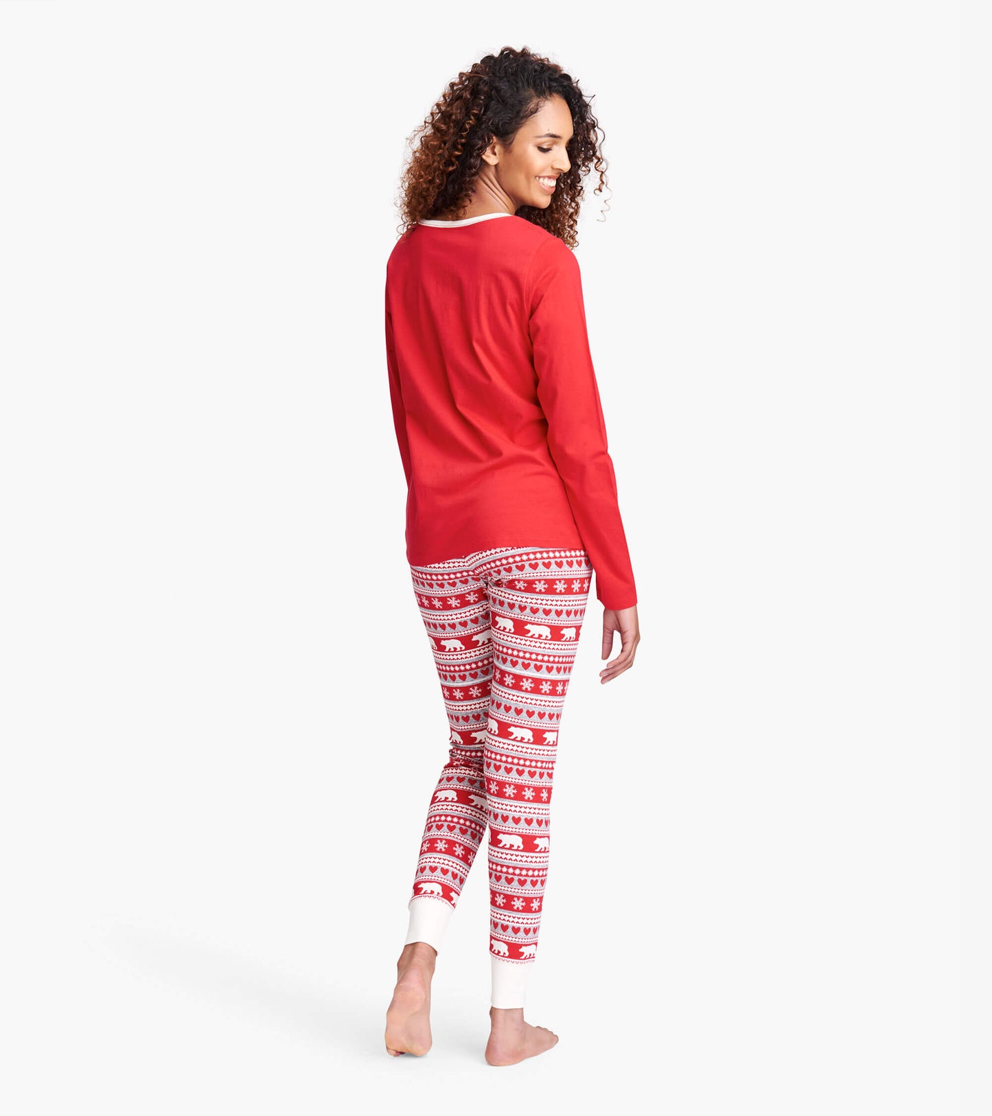 Red Fair Isle leggings featuring a bear and snowflake pattern, perfect for sleepwear or lounging.