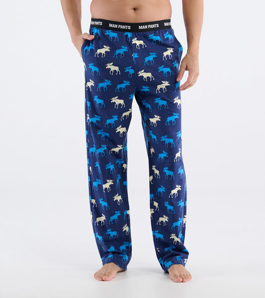 Navy pants featuring a playful moose pattern in blue and cream, with an elastic waistband labeled "MAN PANTS.