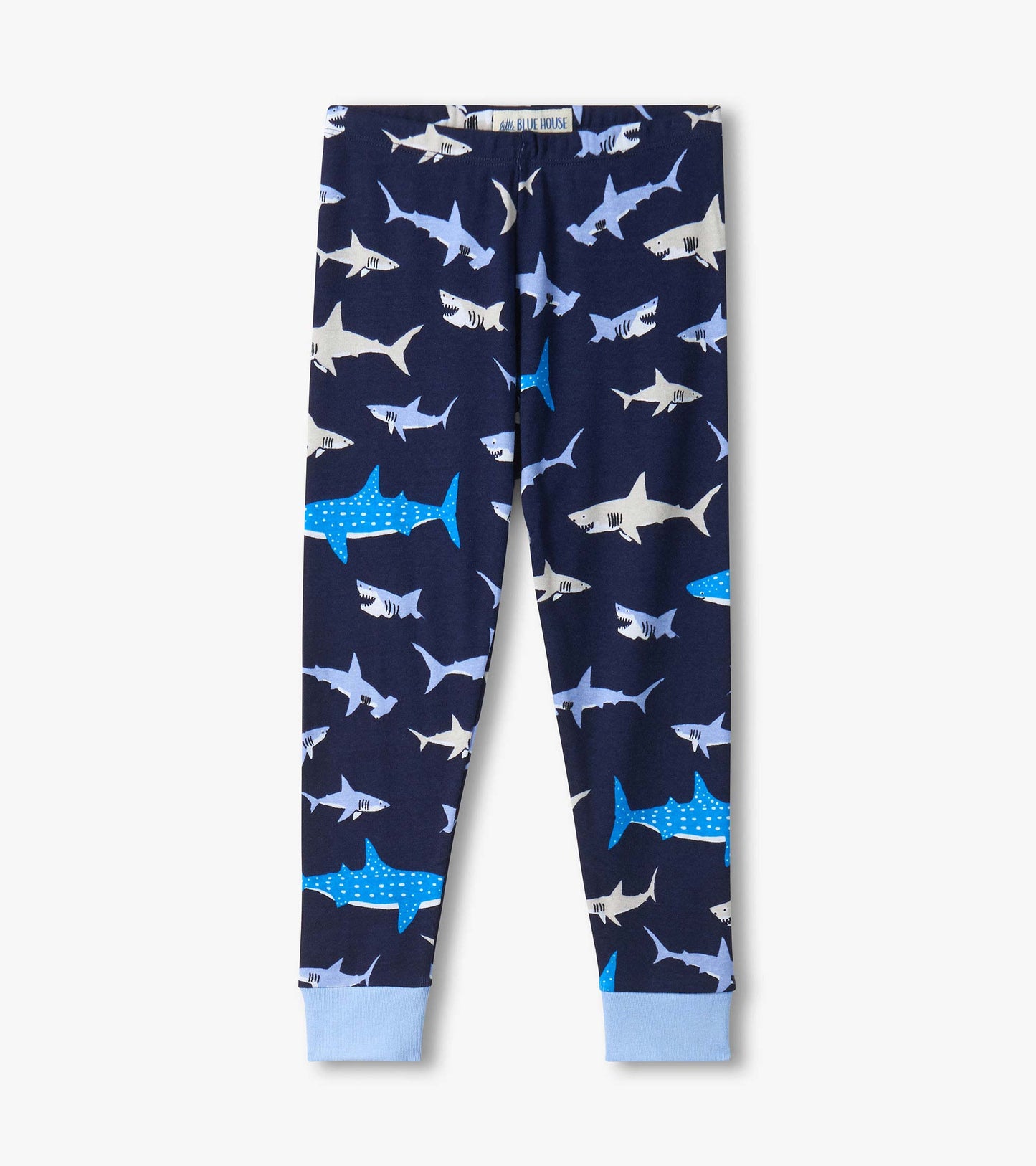 Kids navy pajama pants with shark print and light blue cuffs, front view