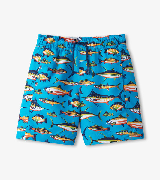 Blue swim trunks featuring a colorful fish pattern, ideal for beach or pool wear. Elastic waistband with drawstring.