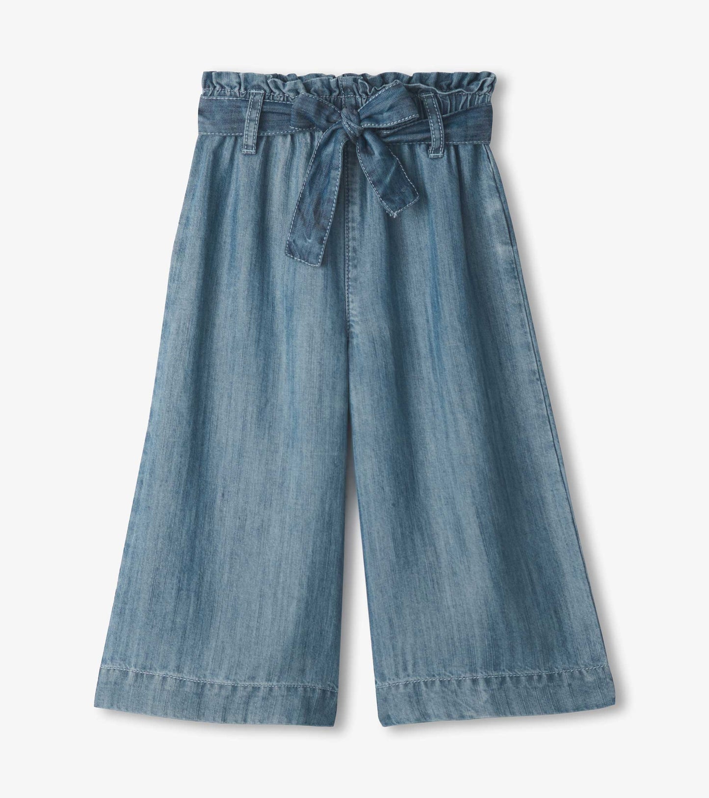 Smokey blue cropped paperbag pants with a ruffled waistband and tie detail, made from soft denim fabric.