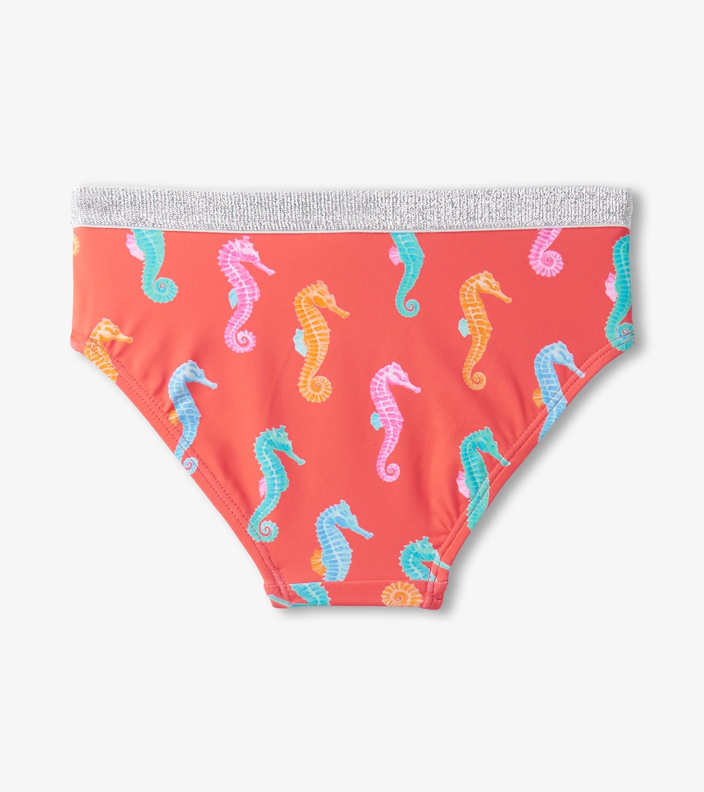 Coral tankini bottom featuring colorful seahorse patterns and a silver waistband. Ideal for beach or pool wear.