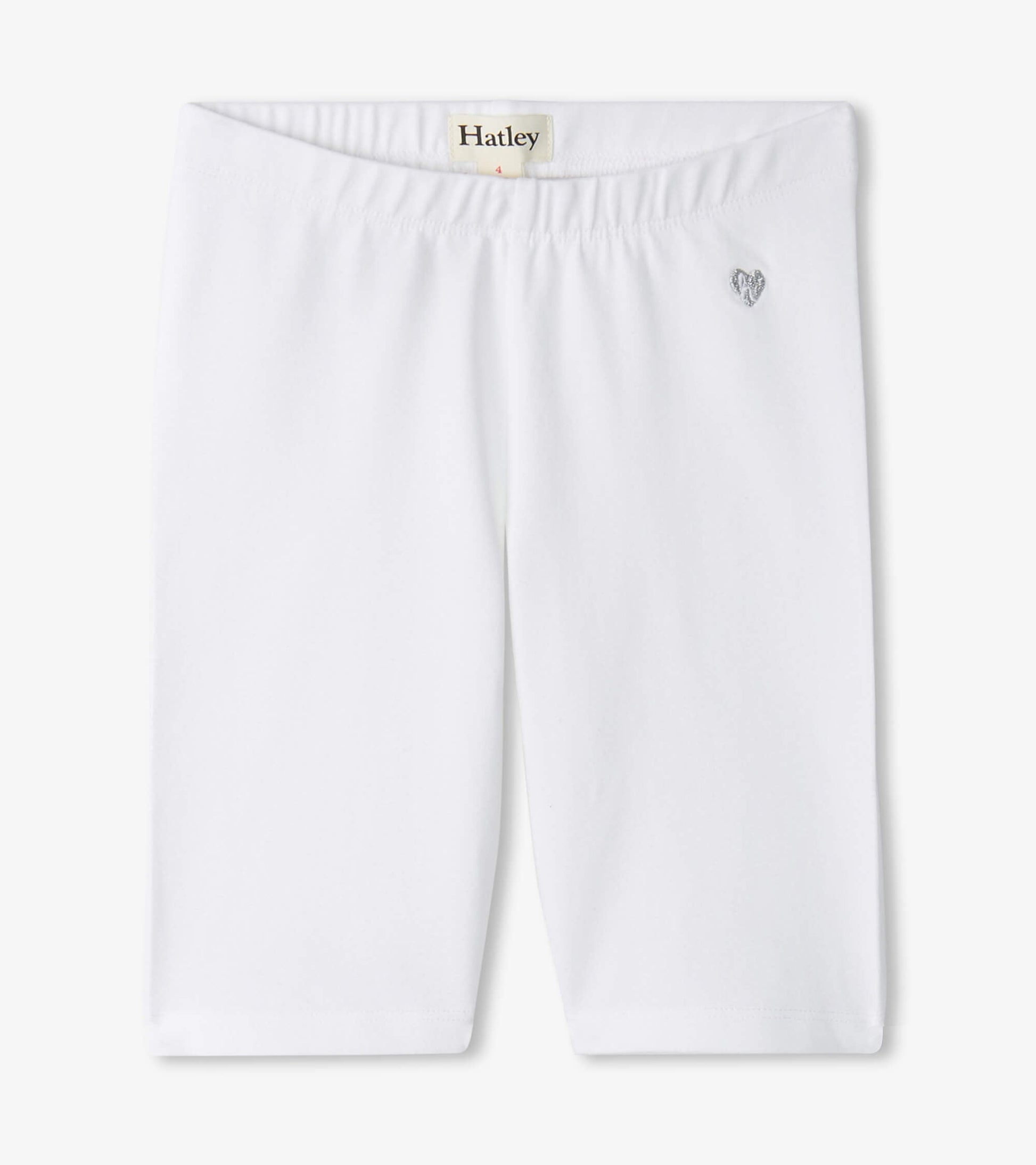 White bike shorts with an elastic waistband and a small heart detail, suitable for active wear.