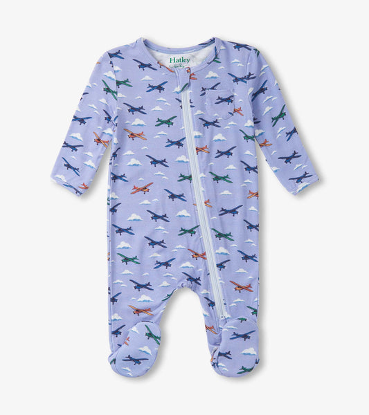 Light purple footed sleeper with airplane print, long sleeves, and a front zipper for easy dressing.
