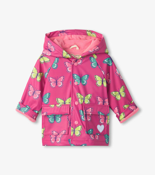 Pink rain jacket featuring colorful butterfly patterns, button-up front, and a hood with soft lining.