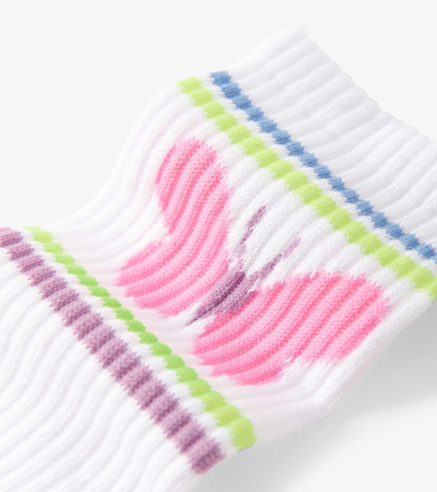 White tube socks featuring a pink butterfly design with colorful striped accents in green, blue, and purple.