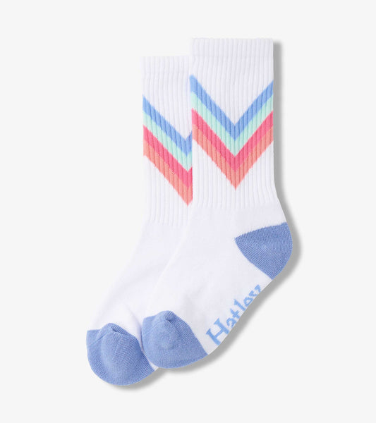 White tube socks featuring a colorful chevron pattern in pink, blue, and mint green with light blue toe and heel accents.