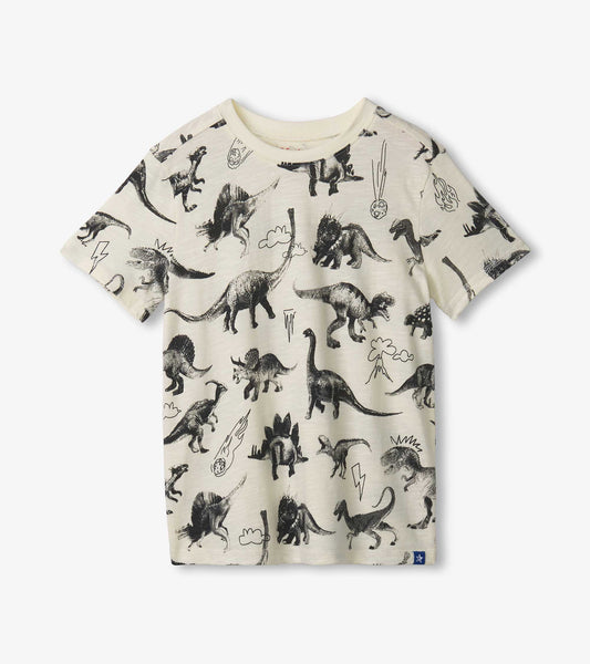 Cream-colored graphic tee featuring various black dinosaur illustrations and extinction-themed elements.