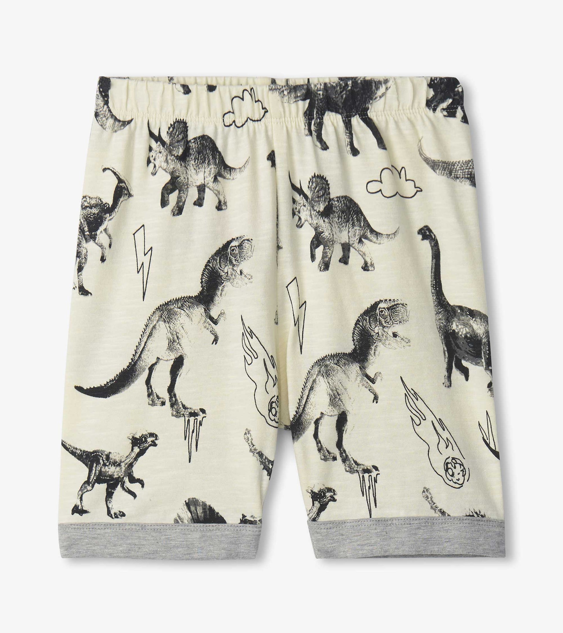 Short pajama set featuring a cream background with black dinosaur and extinction-themed prints, elastic waistband, and gray…