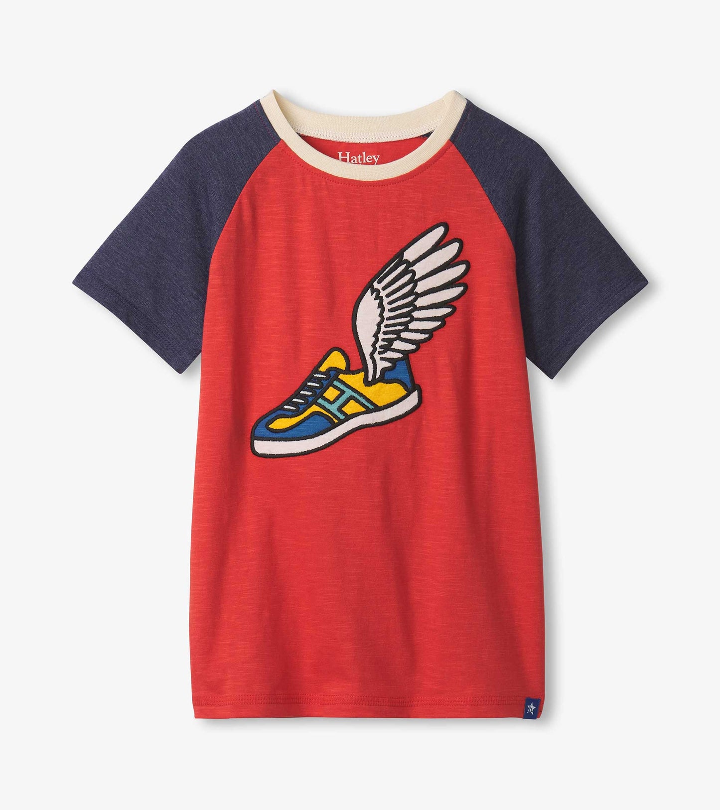 Red raglan t-shirt with navy sleeves featuring a colorful winged sneaker graphic on the front.