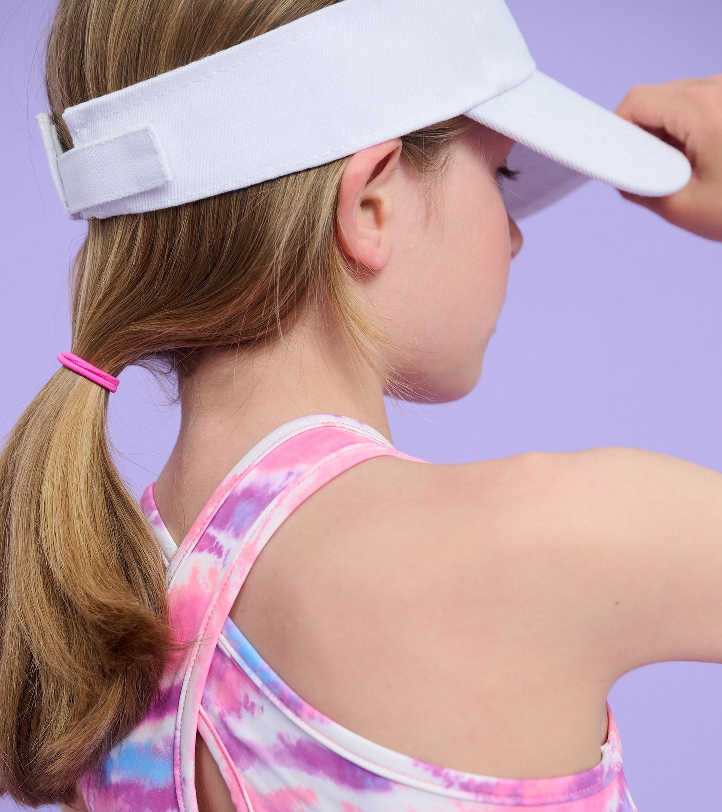 Girls' A-line dress featuring a candy ombre pattern in pink and purple hues, ideal for active wear.